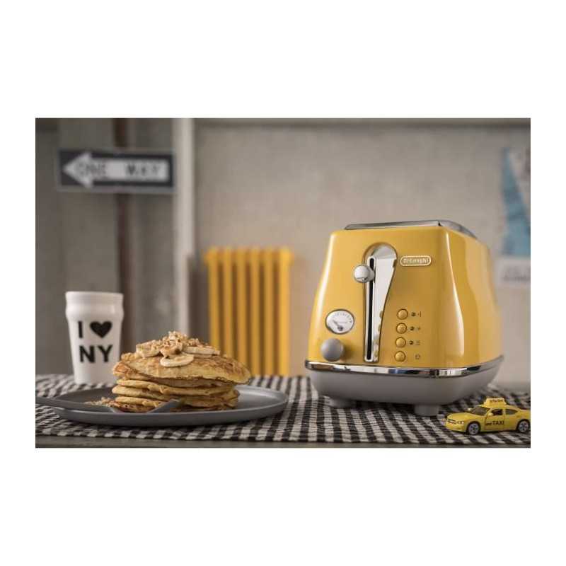 DELONGHI ICONA CAPITALS Tostadora 2 rebanadas - 900W - Tostadora 3 funciones - Calentador de repostería incluido - Amarillo
